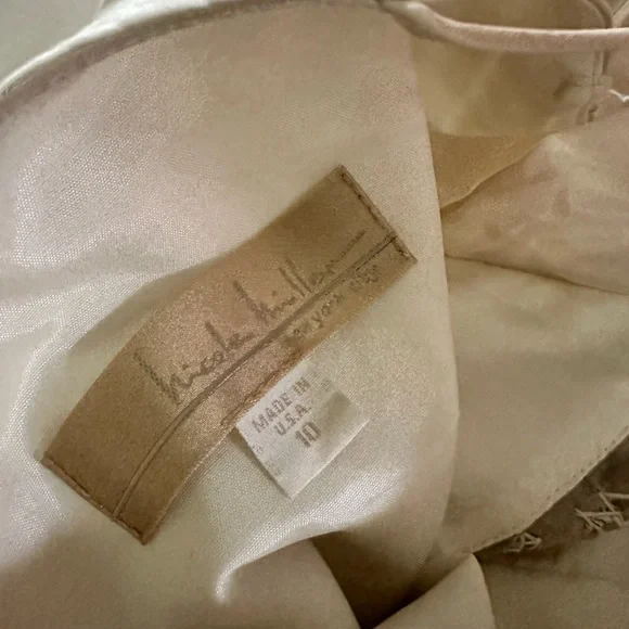 This is a Nicole Miller wedding dress, size 10. It wants to get married again! - Picture 14 of 17